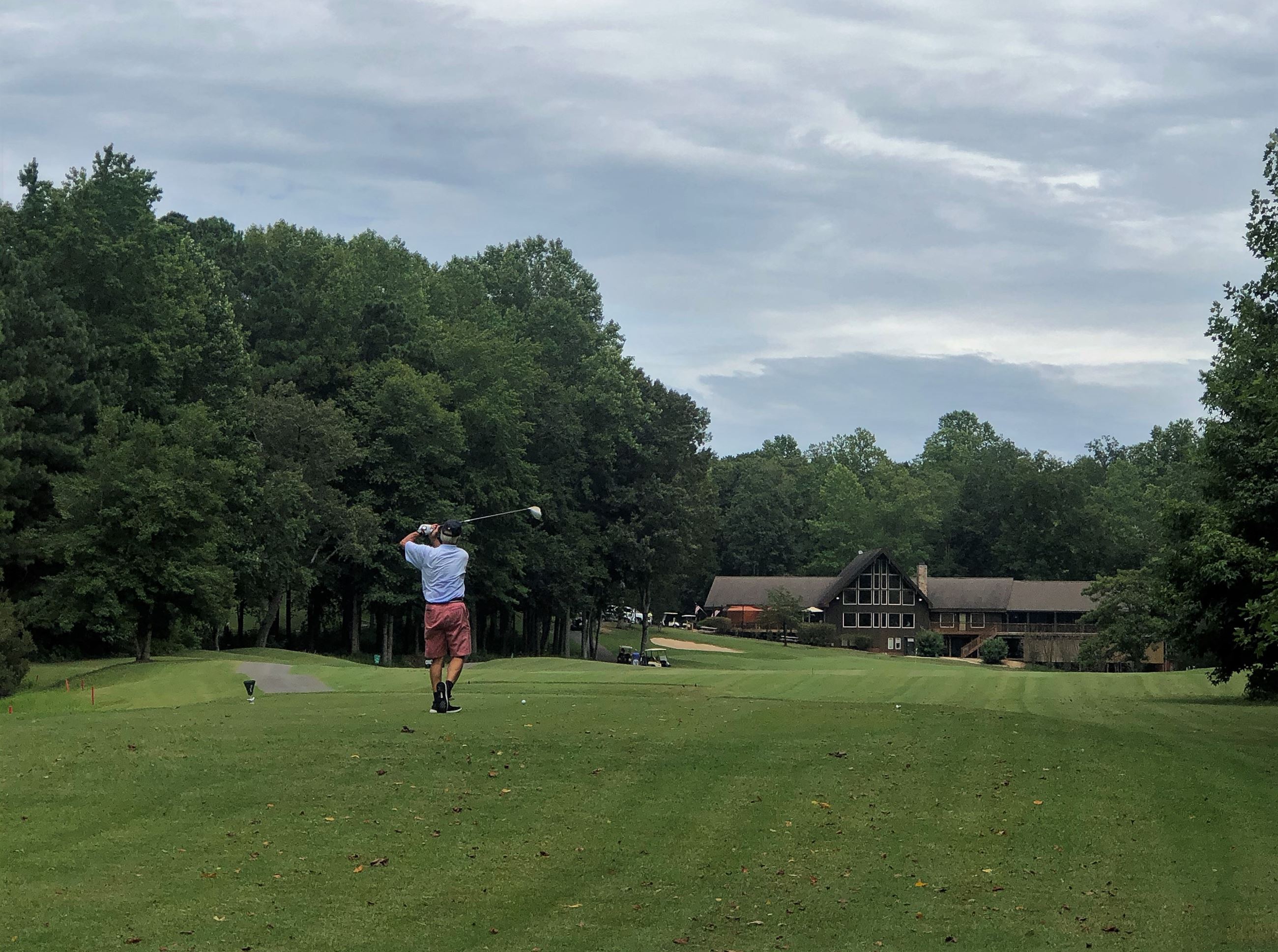 A golfer playing at the Piankatank River Golf Club