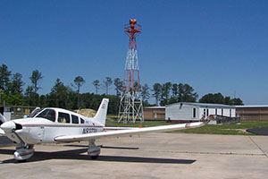 Small airplane on the ground at the Hummel Airfield
